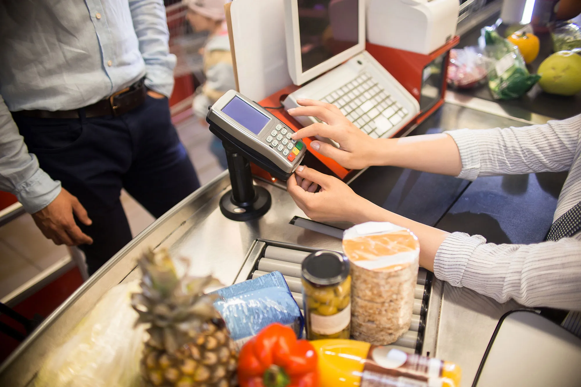 The Future of Retail Management: Trends Shaping the Industry 1 cashier using payment terminal in supermarket 2023 11 27 05 06 13 utc